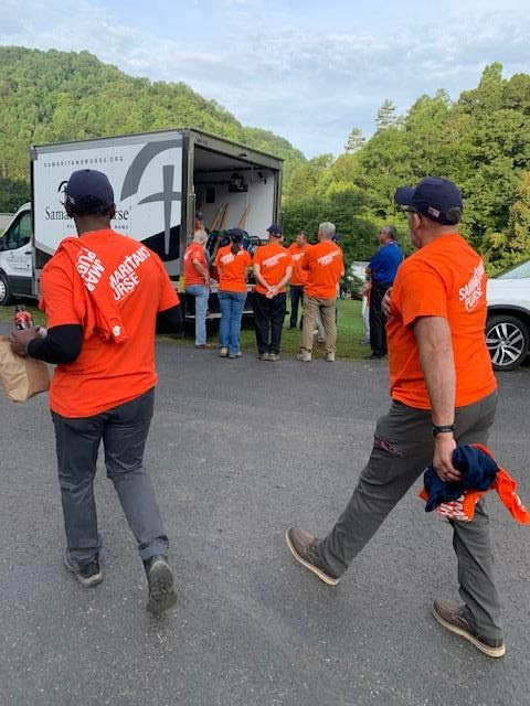 Volunteers preparing to work for the day